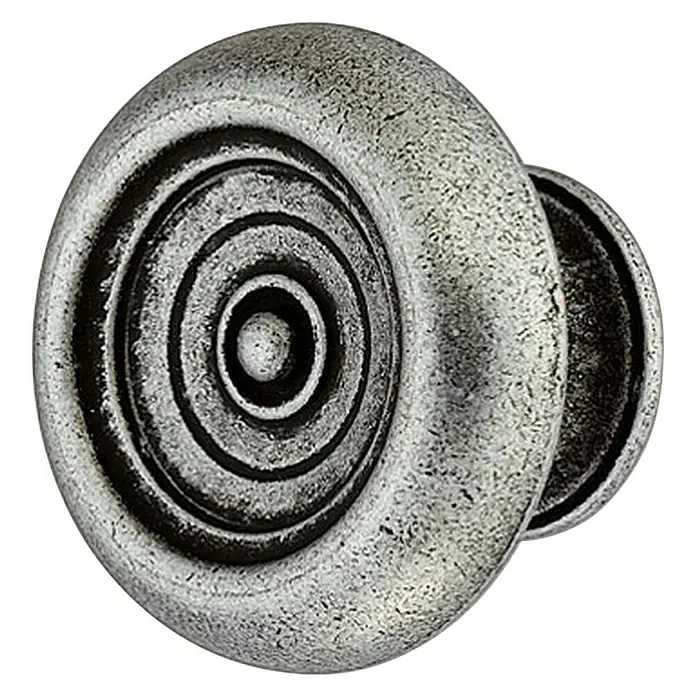 Häfele Pomo para muebles - Tipo de tirador del mueble: Botón, Ø x Al: 35 x 22 mm - Primer plano de un tirador redondo de mueble con círculos concéntricos y un acabado plateado antiguo para cajones y armarios.