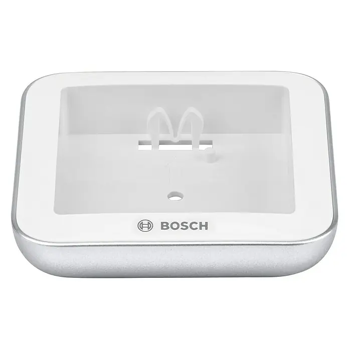 Bosch Smart Home Universalschalter Flex - Reichweite Funk: 200 m - Nahaufnahme einer Ladestation von Bosch mit silbernem Rand und weißem Innenraum.