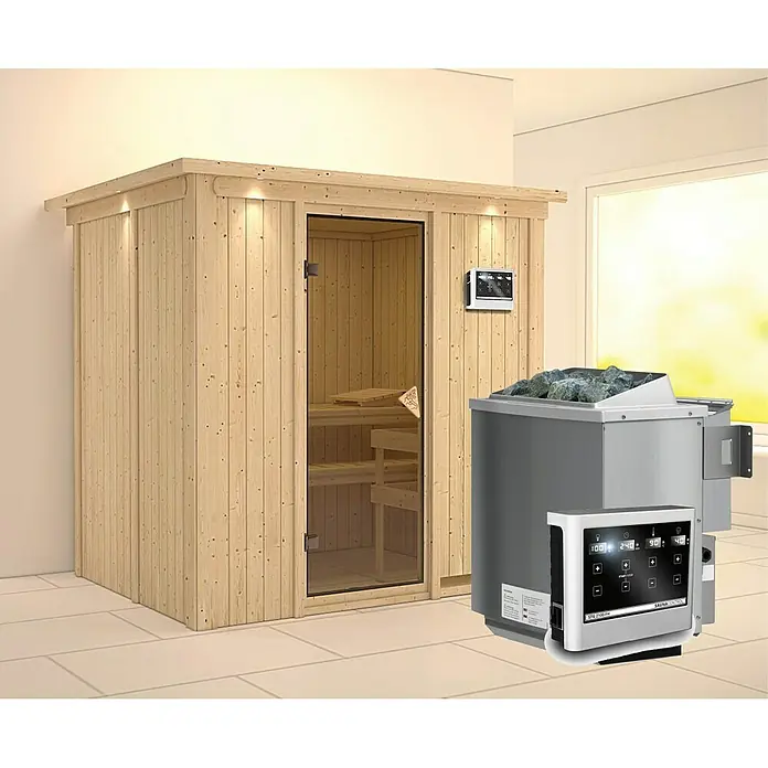 Karibu Elementsauna Bodin - Mit 9 kW Bio-Ofen mit externer Steuerung, Mit Dachkranz und Beleuchtung, L x B x H: 210 x 165 x 192 cm - Innenraumsauna mit Heizelement und Steuerung. Die Sauna ist aus hellem Holz gefertigt und hat eine Glastür.