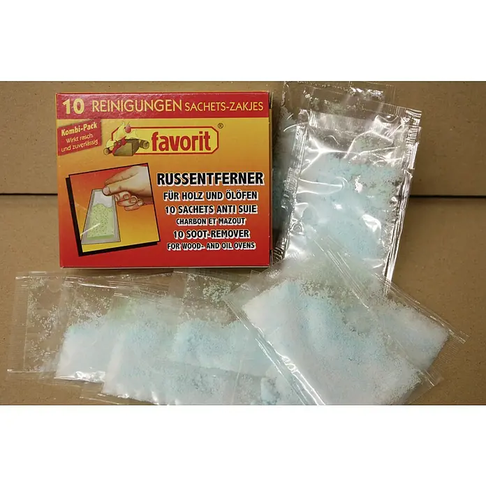 Favorit Kombi-Entrußer - 10 Stk. - Produktbild einer Packung "Favorit Russentferner" mit 10 Reinigungssachets zur Entfernung von Ruß aus Holz- und Ölöfen, inklusive geöffneter Sachets.