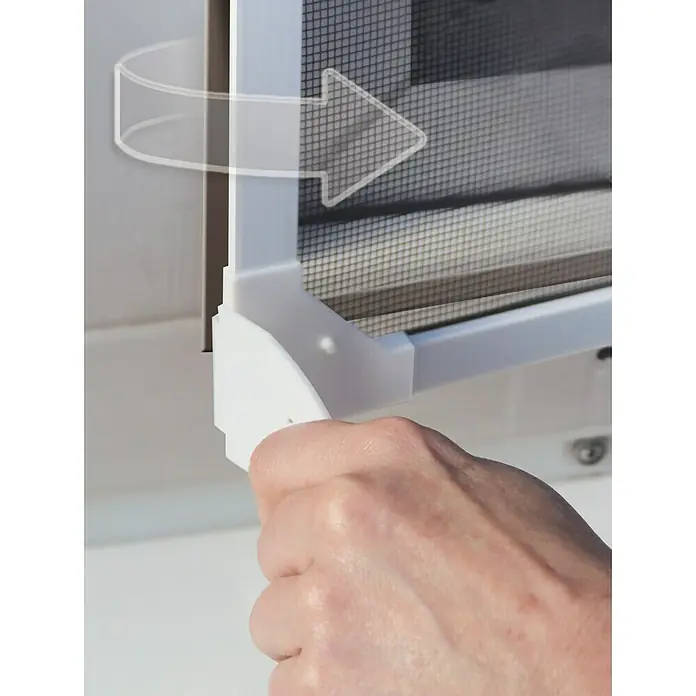 Schellenberg Insect Stop Mosquitera para ventana Magnetic - An x Al: 120 x 120 cm, Montaje de la mosquitera: Fijación magnética, Color bastidor: Blanco - Primer plano de una mosquitera giratoria que se acciona con una mano para abrir o cerrar la ventana.