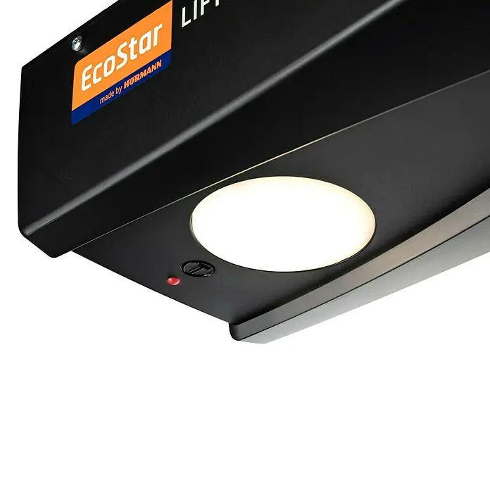 Hörmann EcoStar Garagentorantrieb Liftronic 800 II - Torfläche: 0 m² - 13,75 m², Zugkraft: 800 N - Nahaufnahme eines EcoStar Garagentorantriebs von Hörmann mit integrierter Beleuchtung und roter LED-Anzeige.
