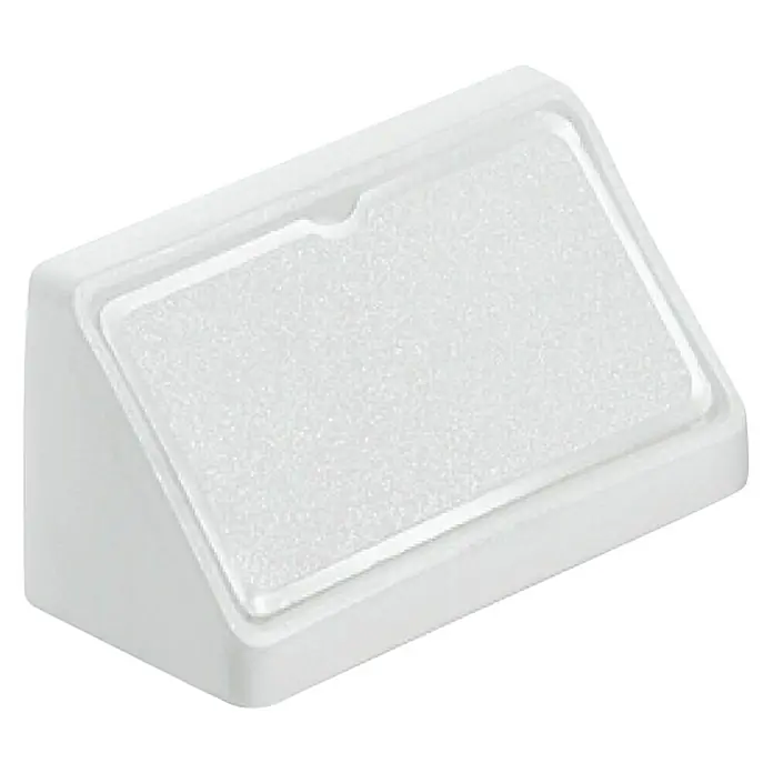 Suki Conector de esquina - 21 x 44 x 21 mm, Blanco - Primer plano de un protector de esquina triangular blanco con acolchado suave en la parte superior, ideal para proteger bordes y esquinas.
