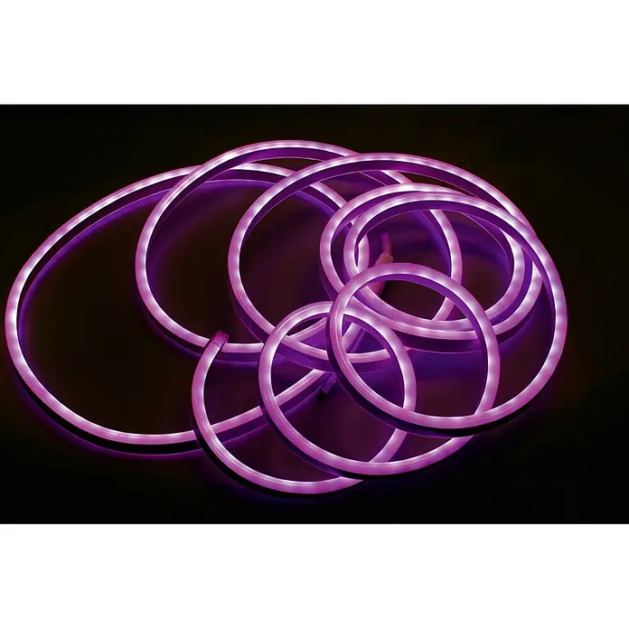 Starlux Tira de luces LED - 5 m, 6 W, RGB - La imagen muestra una colección de anillos de neón púrpura luminosos superpuestos, formando un elemento decorativo moderno.