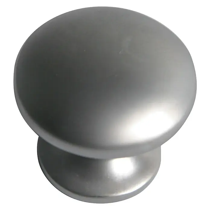 Nesu Pomo para muebles 25317 - Ø x Al: 30 x 27 mm, Acero, Cromo - Primer plano de un tirador redondo plateado para muebles, con una superficie lisa y una forma sencilla y elegante.