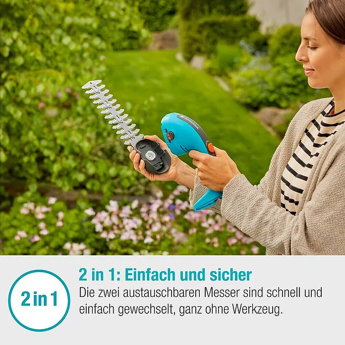 Gardena Power for All 18V Akku-Gras- & Strauchschere 20/18V P4A - 18 V, Li-Ionen, Ohne Akku - Eine Frau wechselt die Klinge einer GARDENA Akku-Grasschere. Das Gerät ist blau und hat einen orangen Knopf.