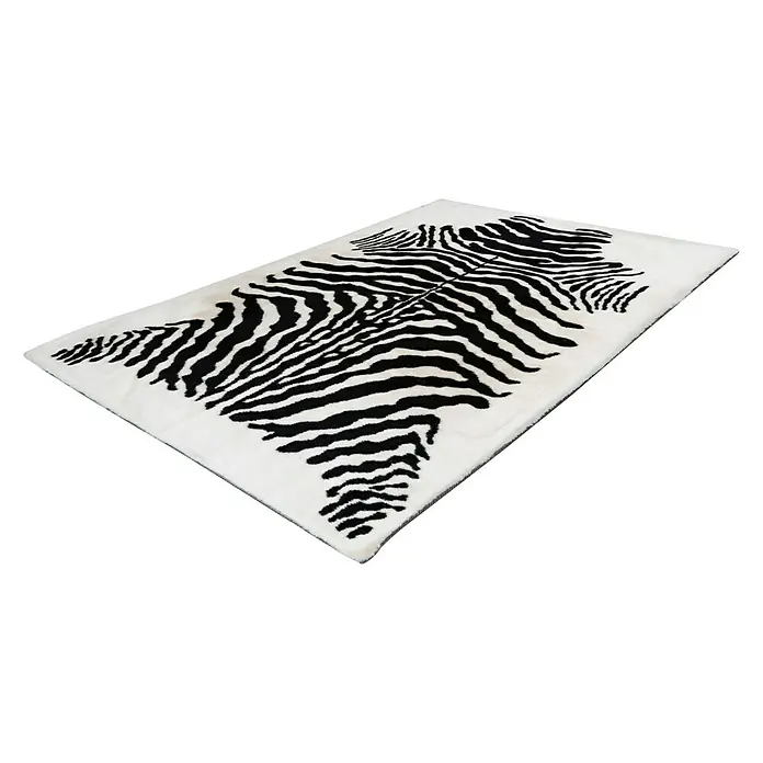 Kayoom Hochflorteppich Zebra - Weiß/Schwarz, 160 x 120 cm, 100 % Polyester - Ein rechteckiger Teppich mit einem Zebra-Muster in Schwarz und Weiß, der einen Hauch von Wildnis in jeden Raum bringt.