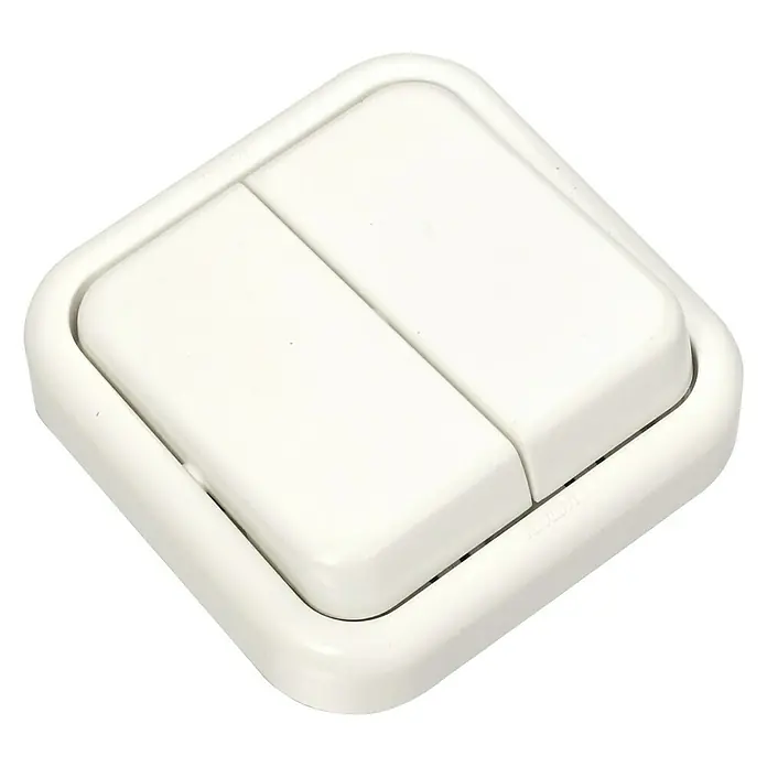 Fontini Kristal Conmutador doble - Blanco, Montaje en superficie - Primer plano de un interruptor de luz doble blanco, destacando la forma minimalista y la funcionalidad del producto.