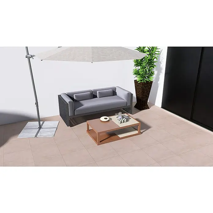 Terrassenfliese Modena - 60 x 60 x 2 cm, Taupe, Matt - Eine stilvolle Terrasse mit einer grauen Couch, einem Couchtisch und einem Sonnenschirm für entspannte Stunden im Freien.