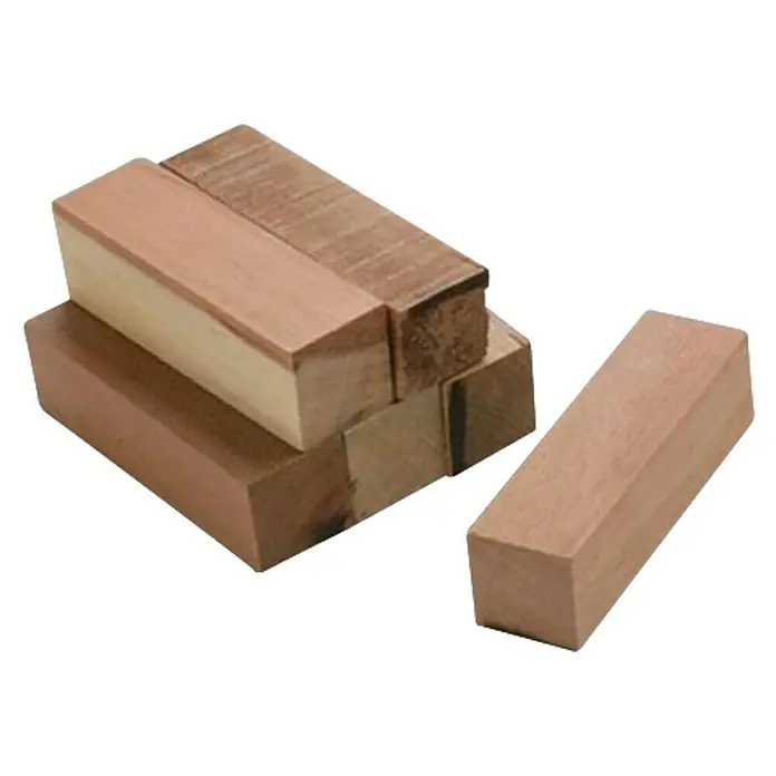 Nmc Kit de instalación para viga de poliuretano - 6 ud. - Pila de seis bloques de madera en varios tonos de marrón, ideales para proyectos de manualidades o como elementos decorativos.