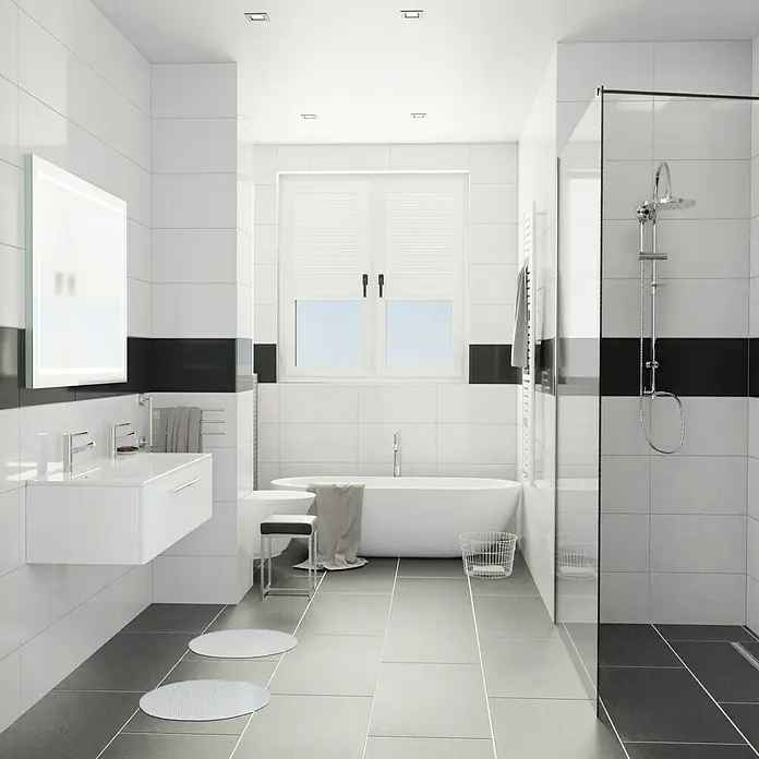 Camargue Espacio Badmöbel-Set K11 - 120 cm, Mira - Helles Badezimmer mit weißen Fliesen, einer freistehenden Badewanne und einer modernen Dusche. Das Waschbecken ist schlicht und elegant.
