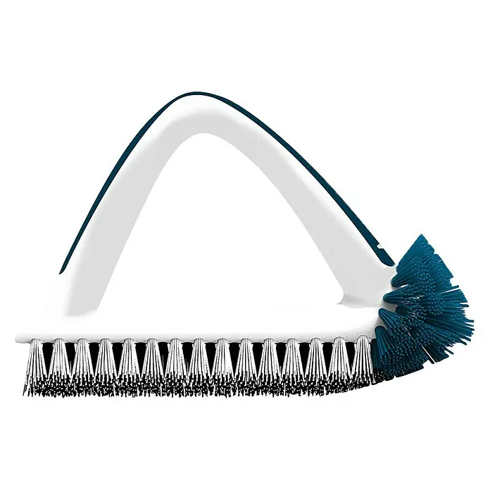 Unger Handbürste Flachbürste - Weiß/Blau, 20 x 7 x 17 cm - Abgebildete Eckfugenbürste mit schwarzem Borstenfeld und blauem Borstenbüschel. Der Griff ist weiß mit blauen Akzenten.