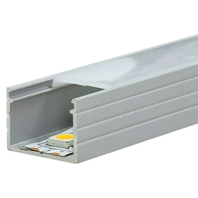 Alverlamp Perfil de superficie - L x An x Al: 20 x 1,8 x 1,3 cm, Aluminio - Primer plano de un perfil de aluminio LED con cubierta. Ideal para iluminación indirecta y diseño moderno.