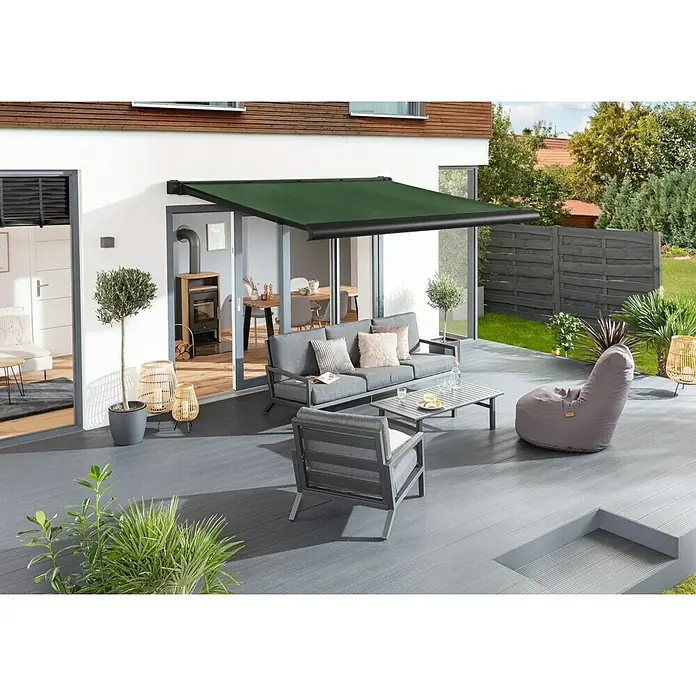Sunfun Vollkassettenmarkise Elba - Grün, Farbe Gestell: Tiefschwarz, Breite: 4 m, Ausfall: 3,5 m - Elegante Terrassenüberdachung mit grüner Markise und stilvollen Gartenmöbeln für entspannte Stunden im Freien.