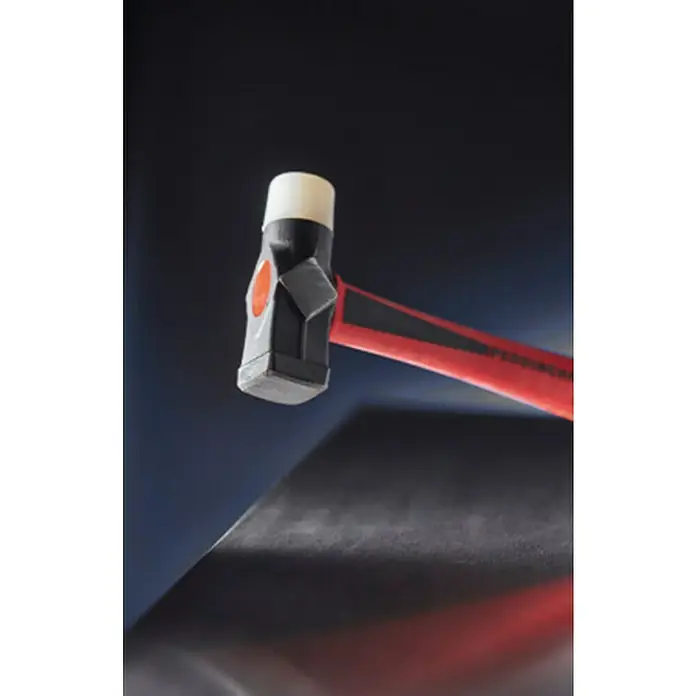 Peddinghaus Schlosserhammer - Material Stiel: Glasfaserverstärkter Kunststoff (GfK), Durchmesser Kopf: 27 mm - Nahaufnahme eines Schonhammers mit rotem Griff und einem Kopf mit einem weißen und einem grauen Schlagstück, liegend auf einer Oberfläche.