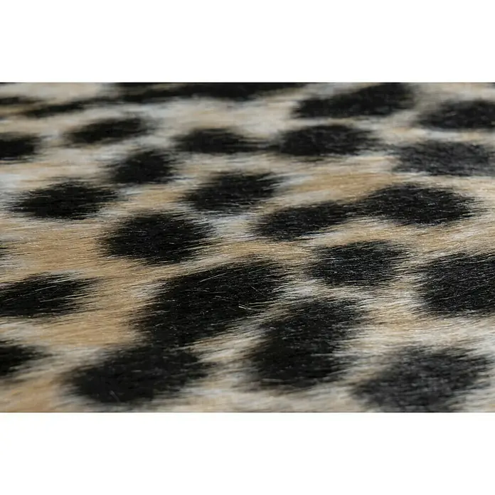 Kunstfell Rodeo - Beige/Schwarz, 200 x 150 cm, 100 % Polyester, Gepard - Nahaufnahme eines Teppichs mit Leopardenmuster, der die Details und die Textur des Teppichs hervorhebt.