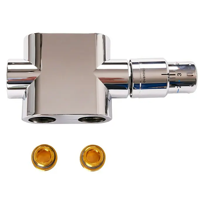 Szagato Mittelanschlussblock - ½″, Durchgang, Chrom - Nahaufnahme eines glänzenden Heizkörperthermostats mit zwei goldenen Ventilkappen auf schwarzem Hintergrund.