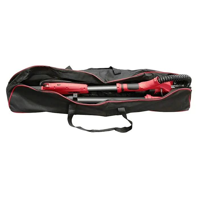 Berg Tecmix Wand- & Deckenschleifer TM LHS 710 D - 230 V, 710 W, Durchmesser Schleifteller: 225 mm - Ein roter Trockenbauschleifer in einer schwarzen Tragetasche mit roter Umrandung. Das Werkzeug ist für den einfachen Transport verstaut.