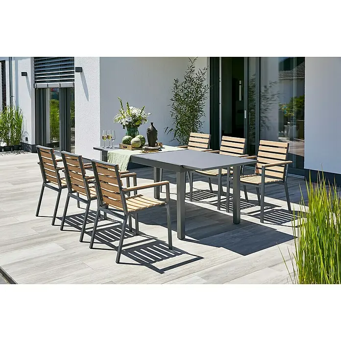 Gartenmöbel-Set Maja/Carina - 7 -tlg., Glas/Aluminium/Akazie, Anthrazit/Naturbraun, Tischplatte ausziehbar - Einladende Gartengarnitur mit grauem Tisch und Holzstühlen für entspannte Stunden im Freien. Das stilvolle Ensemble bietet Platz für gesellige Runden.
