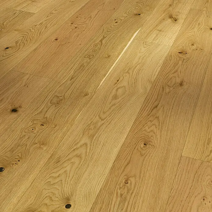 Parador Parkett Basic 11.5 - Rustikal Eiche, Landhausdiele, 2.200 x 185 x 11,5 mm - Nahaufnahme von hellem Eichenparkett mit natürlichen Astlöchern und Maserungen, ideal für warme Innenräume und stilvolle Designs.