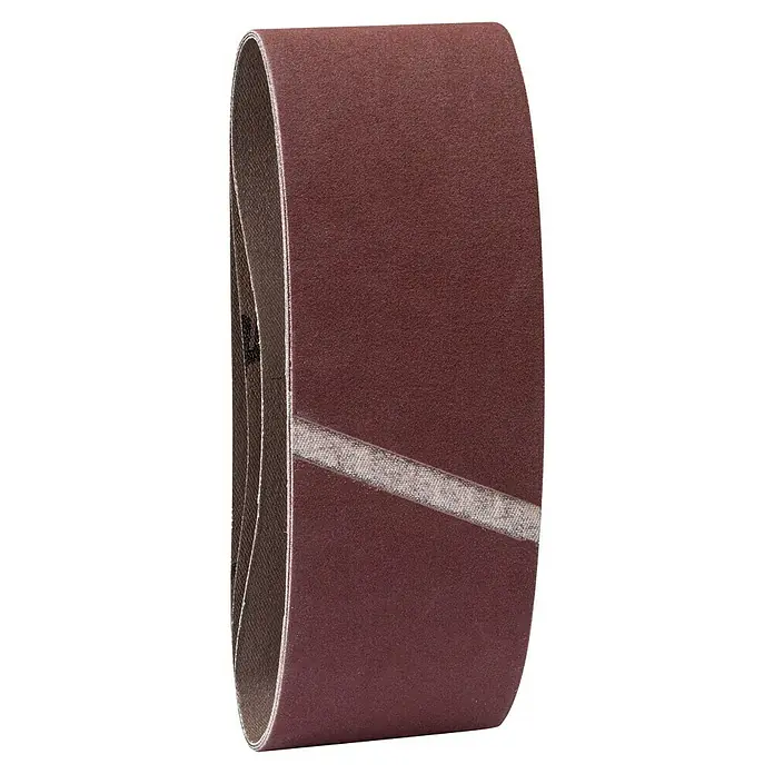 Craftomat Lija de banda - L x An: 410 x 65 mm, Grano: 180, 3 ud. - Primer plano de una lija de banda marrón con una franja más clara, utilizada para lijar y dar acabado.