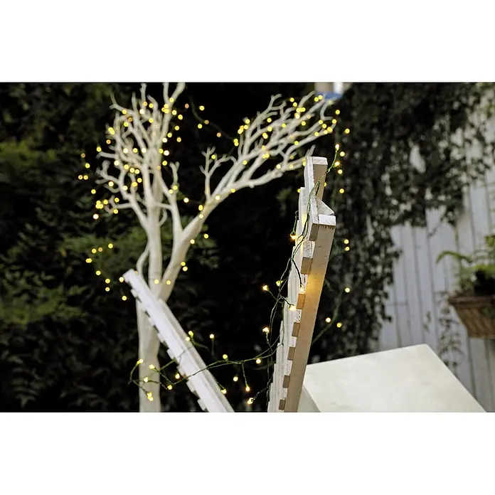 Tween Light Guirnalda luminosa LED Micro - Para exterior, Color de luz: Blanco cálido, Número de bombillas: 200 ud. - Árbol blanco decorativo con luces cálidas, ideal para crear un ambiente acogedor en el jardín.