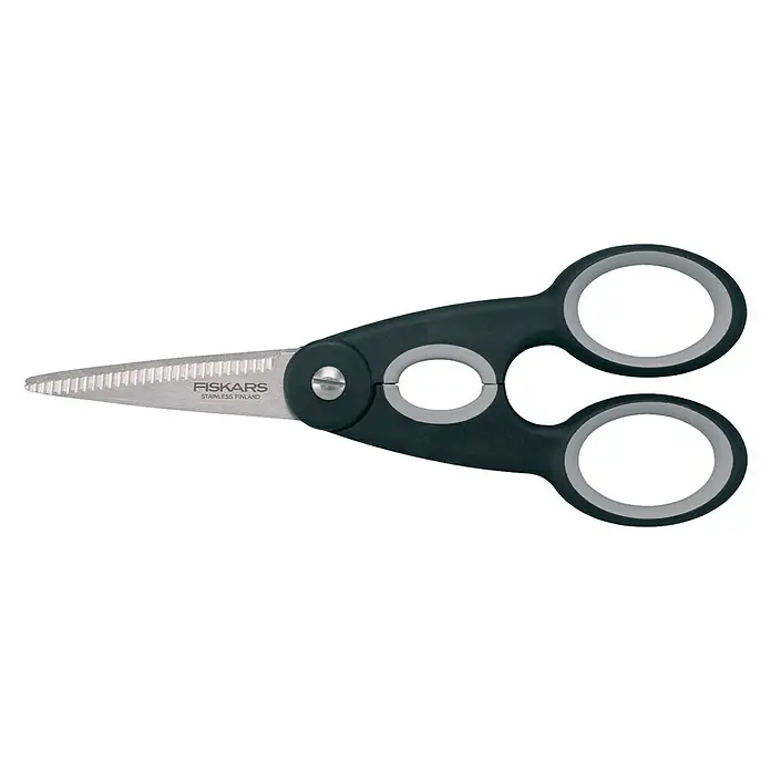 Fiskars Küchen-Schere - Länge: 21 cm - Detailaufnahme einer Fiskars Kräuterschere mit ergonomischem Griff und gezackten Edelstahlklingen, ideal für Kräuter und feine Schnitte.