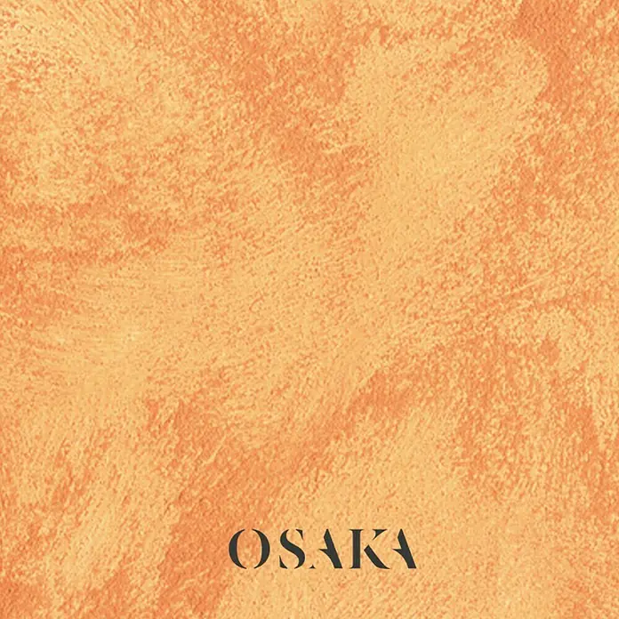 Osaka Pintura para efectos decorativos Arena - 5 l, Naranja, Mate - Arte abstracto de pared naranja con la palabra "OSAKA", que muestra una superficie texturizada y una paleta de colores cálidos.