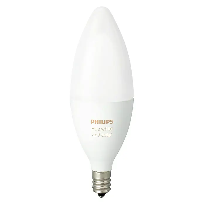 Philips Hue Bombilla LED RGB - E14, Intensidad regulable, RGBW, 470 lm, 6,5 W - Primer plano de una bombilla vela Philips Hue White and Color, que ofrece iluminación inteligente y toques de color.