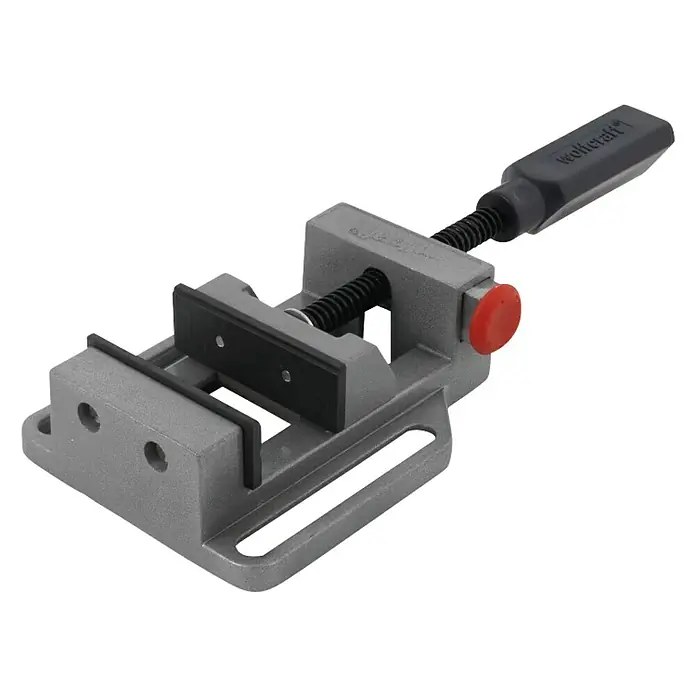 Wolfcraft Mordaza de sujeción - Anchura de sujeción: 60 mm - Primer plano de una mordaza de trabajo con cuerpo de metal gris, tornillo negro y pomo rojo.