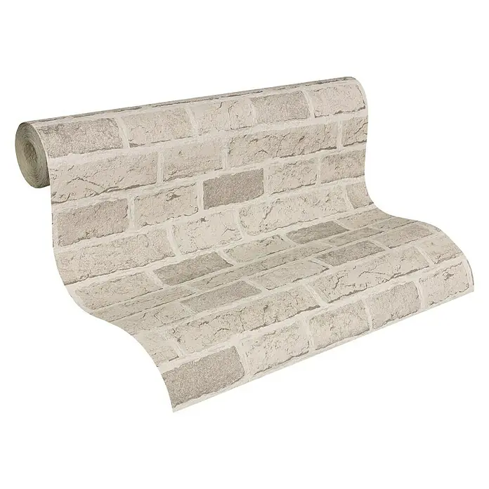 A.S. Création Il Decoro Papiertapete - Taupe, Steinoptik, 10,05 x 0,53 m - Ein aufgerolltes Stück Tapete mit einem realistischen Steinmuster in Grau- und Beigetönen für eine stilvolle Wandgestaltung.