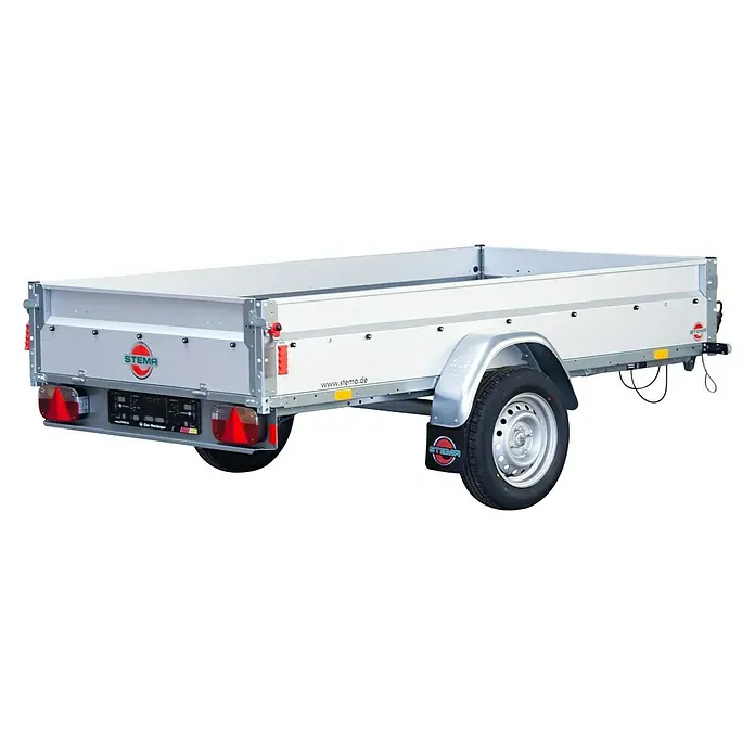 Stema Anhänger BASIC STL 750-25 - Nutzlast: 573 kg, Einachser, Kasteninnenmaß: 251 x 128 x 35 cm, Ungebremst - Ein silberner Stema Anhänger mit schwarzem Hintergrund. Der Anhänger ist leer und scheint in gutem Zustand zu sein.
