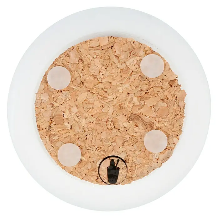 Venus Ivo Zahnputzbecher - Polyresin, Weiß - Nahaufnahme eines Glasuntersetzers mit Korkoberfläche, vier Füßen und einem Symbol, ideal für den stilvollen Schutz Ihrer Oberflächen.