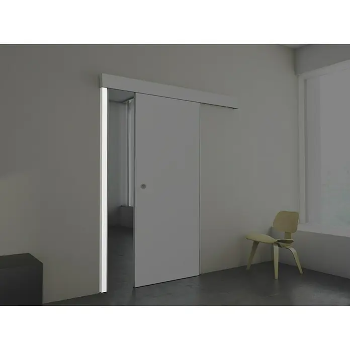 Estructura batiente Blanca Lacada - 67 x 2.140 mm - Sistema de puerta corredera minimalista. La puerta está encajada en la pared, proporcionando una transición perfecta.