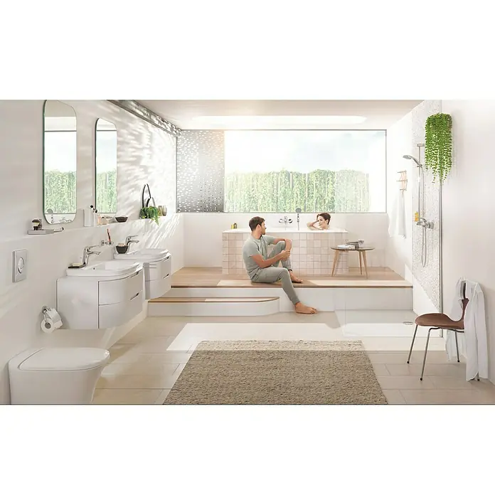 Grohe Eurostyle Badewannenarmatur - Ausladung Armatur: 185 mm, Chrom, Glänzend - Ein modernes Badezimmer mit weißen Möbeln, inklusive Waschbecken, Toilette und Badewanne, für ein entspannendes Ambiente.