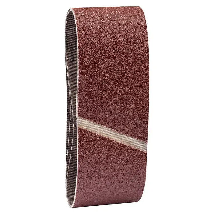Craftomat Lija de banda - L x An: 410 x 65 mm, Grano: 60, 3 ud. - Primer plano de una banda de lija utilizada para alisar superficies. Perfecto para madera y metal en talleres.