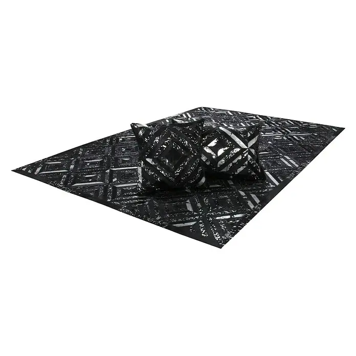 Kayoom Lederteppich DazzleSchwarz/Silber, 150 x 80 cm, 100 % Leder - Schwarzer Teppich mit geometrischem Muster und passenden Kissen für eine moderne Raumgestaltung.