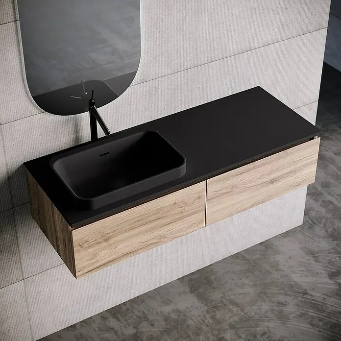 Lavabo y encimera Paul izquierda - 46 x 121 cm, Orificios para grifo: Izquierda, Con desbordamiento, Negro - Elegante lavabo de baño con encimera negra y mueble de madera bajo un espejo redondeado.