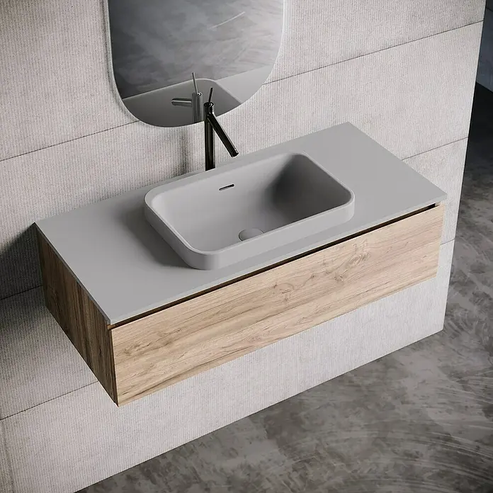 Lavabo y encimera Paul - 46 x 101 cm, Orificios para grifo: Medio, Con desbordamiento, Gris - Elegante lavabo de baño con mueble de madera y un moderno lavabo sobre encimera gris bajo un espejo ovalado.
