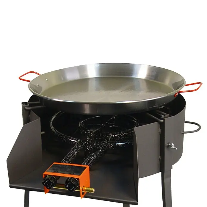Barbacoa de carbón Dickson L - Diámetro de la superficie de la parrilla: 50 cm, Marrón/Metalizado - Quemador de paella con una paellera encima. El quemador es gris y tiene una unidad de control naranja.