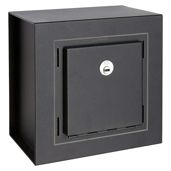 Arregui Grid Caja fuerte empotrable 13000W-S0 - L x An x Al: 20 x 20 x 13 cm, Tipo de bloqueo: Llave, 6 l - La imagen muestra una caja fuerte con un ojo de cerradura en el centro de la puerta, incrustada en una caja negra, de aspecto robusto y seguro.