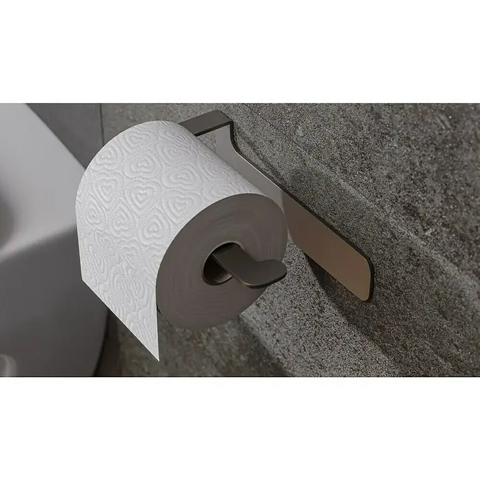 Camargue Antwerpen Papierrollenhalter - 16,5 x 9 x 5,5 cm, Graphit, Matt - Nahaufnahme einer Toilettenpapierrolle mit Herzmuster auf einem modernen Halter, befestigt an einer strukturierten Wand.