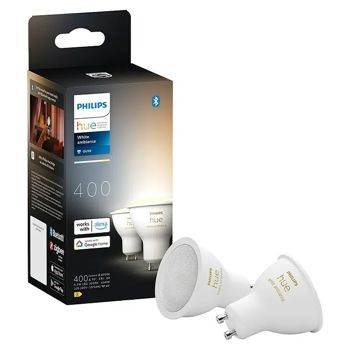 Philips Hue Smart-LED-Lampe White Ambiance - GU10, Dimmbar, Mehrfarbig, 400 lm, 4,2 W, 2 Stk. - Nahaufnahme der Philips Hue White Ambiance GU10 Lampen und der Produktverpackung, die intelligente Beleuchtungslösungen zeigt.