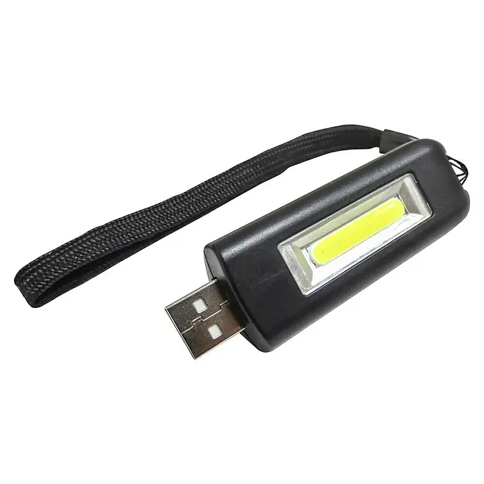 BAUHAUS Taschenlampe - 83 x 29 x 18 mm, 80 lm, IP20 - Nahaufnahme einer schwarzen USB-betriebenen LED-Taschenlampe mit Handschlaufe, ideal für den Notfall oder als praktisches Gadget.