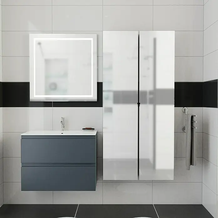 Camargue Espacio Waschtischunterschrank - 80 x 40 x 60 cm, 2 Schubkästen, Gama anthrazit matt - Badezimmer-Interieur mit einem Unterschrank in Grau, einem beleuchteten Spiegel und einem weißen Hängeschrank für ein modernes Ambiente.