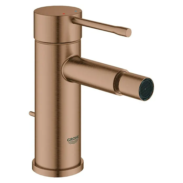 Grohe Essence New Bidetarmatur - Warm Sunset, Matt - Nahaufnahme einer GROHE Armatur in gebürstetem Roségold für das Badezimmer, die ein modernes und elegantes Design zeigt.