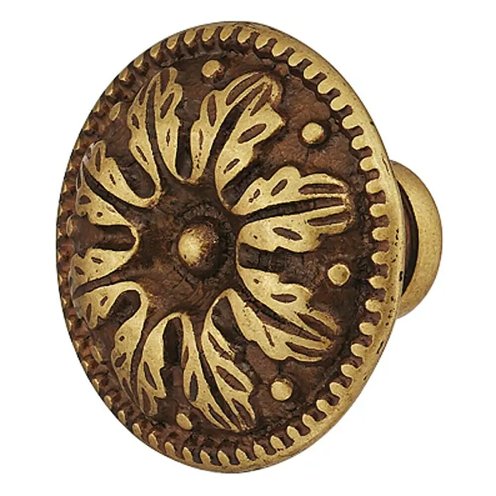 Häfele Pomo para muebles - Tipo de tirador del mueble: Botón, Ø x Al: 26 x 19 mm - Primer plano de un pomo de metal ornamentado para muebles con detalles intrincados y acabado rústico.
