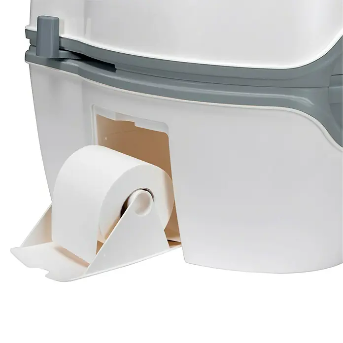 Thetford Campingtoilette Porta Potti Excellence 565E - L x B x H: 45 x 38,8 x 44,8 cm, Tragbar, Elektrische Wasserspülung - Nahaufnahme einer tragbaren Toilette mit einer Rolle Toilettenpapier im integrierten Halter. Praktische Lösung für unterwegs.