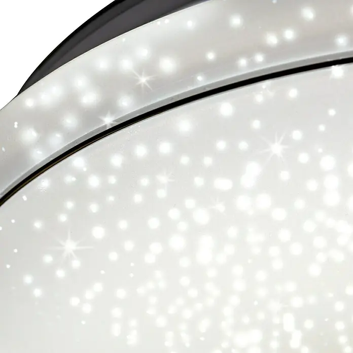 Just Light LED-Deckenleuchte rund Jupiter - 28 W, Weiß, Warmweiß, Durchmesser: 440 mm - Nahaufnahme einer modernen Deckenleuchte mit Sterneneffekt, die ein warmes und einladendes Licht ausstrahlt.\n