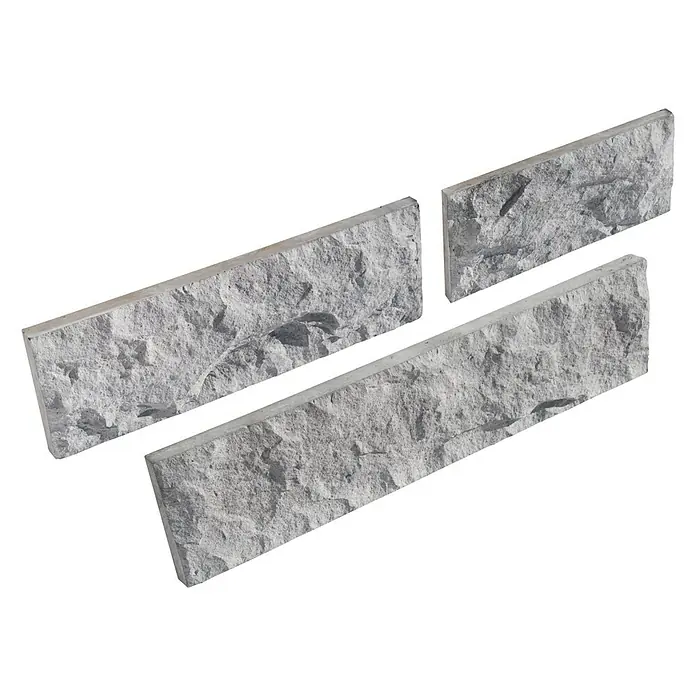 Revestimiento de piedra Cantabria - Gris, Cantidad total: 4 pzs. - Primer plano de tres paneles de pared de ladrillo gris con superficie y textura irregular, diseñados para revestimientos de paredes interiores y exteriores.